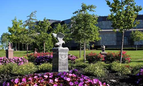 The meditation cremation garden at Guardian Angel features many flowers and unique cremorials.