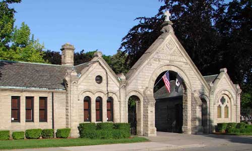 This image shows the entrance of historic Mt. Elliott Cemetery and the beautiful gateway one encounters upon entering.