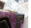 A generic photo of old letters and what looks to be an antique photo album